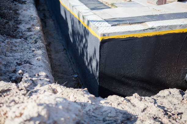 Professional Emergency Waterproofing technician working in Remus, MI